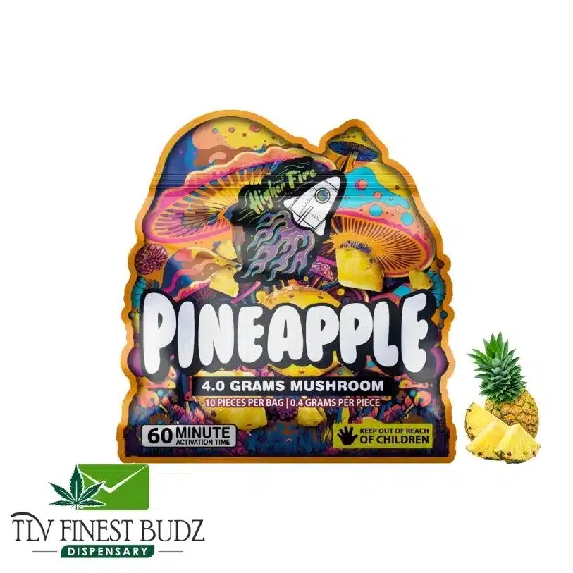 Colorful packaging for pineapple-flavored mushroom edibles, featuring vibrant graphics and dosage information. TLV Finest Budz logo displayed.